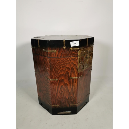 317 - A Korean elm octagonal lidded box with brass fittings - approx. 41cm high x 33.5cm wide x 33.5cm dee... 