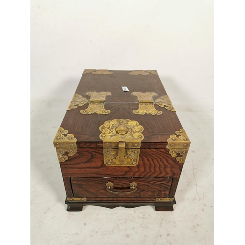 318 - A Korean elm mirrored vanity box with brass fittings and single drawer - approx. 91cm high x 21cm de... 