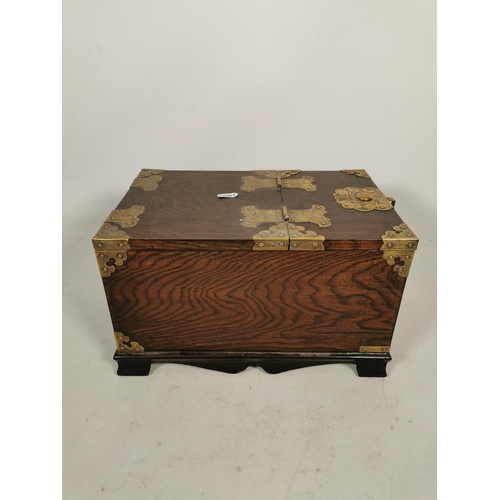 318 - A Korean elm mirrored vanity box with brass fittings and single drawer - approx. 91cm high x 21cm de... 