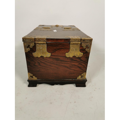 318 - A Korean elm mirrored vanity box with brass fittings and single drawer - approx. 91cm high x 21cm de... 