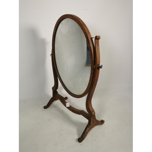 320 - A Victorian mahogany framed swinging circular dressing table mirror