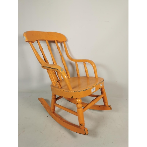 323 - A vintage orange painted pine childs farmhouse rocking chair - approx. 53cm high x 33cm wide x 51cm ... 