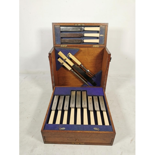 327 - An early 20th century oak cutlery box containing Hammond Creake & Co cutlery - approx. 32cm high x 3... 