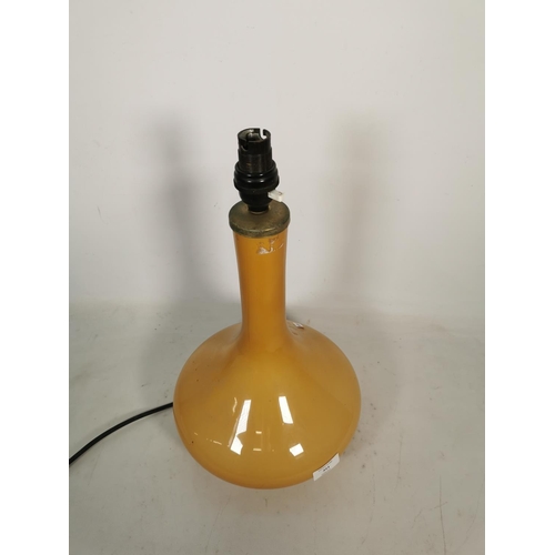 351 - A mid 20th century Holmegaard style amber glass table lamp - approx. 42cm high