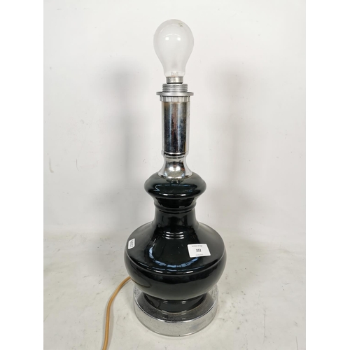 352 - A mid 20th century green ceramic table lamp on chrome base - approx. 42cm high without bulb