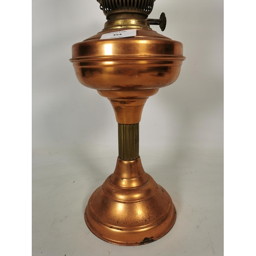 354 - A Sherwoods Ltd of Birmingham copper and brass oil lamp with glass funnel - approx. 60cm high