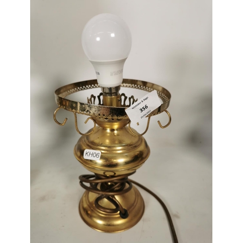 356 - Three various brass lamps, one table lamp and two Duplex oil lamps