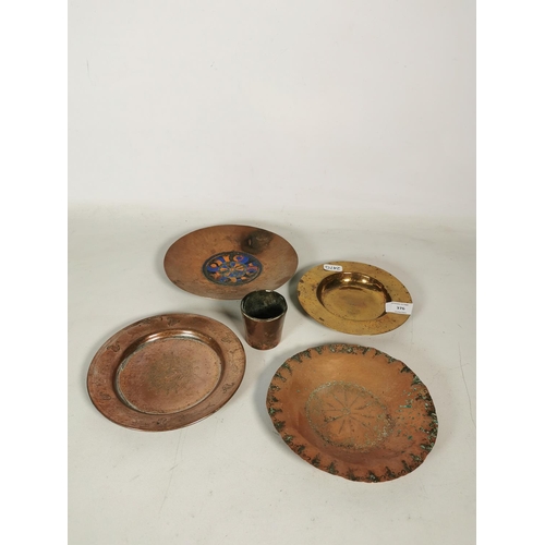 376 - Four assorted vintage copper dishes and one copper measuring cup