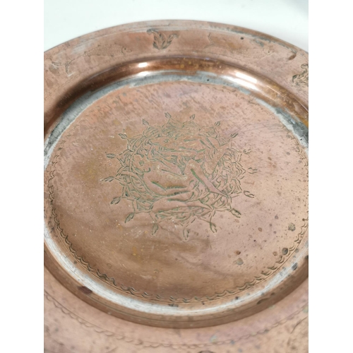 376 - Four assorted vintage copper dishes and one copper measuring cup