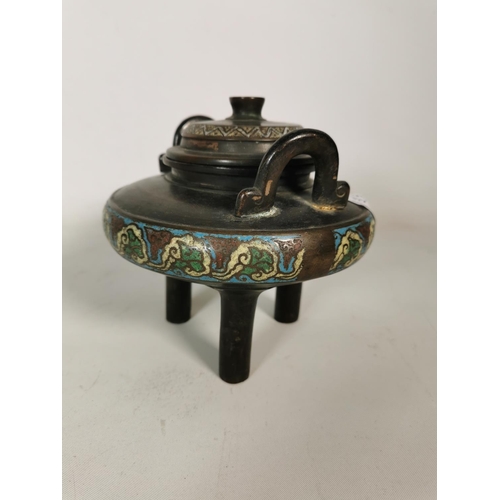 377 - Two items, one oriental bronze twin handled incense burner on tri footed base with enamel border dec... 