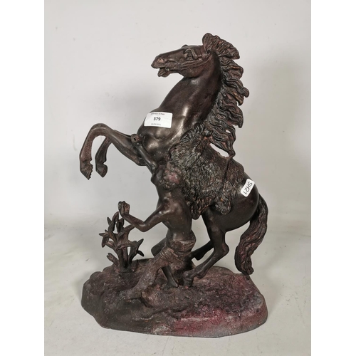 379 - A large spelter rearing horse and man figurine - approx. 40cm high