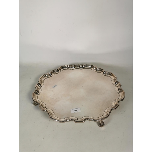 381 - A vintage EPNS tri footed salver with scalloped edge - approx. 42cm square