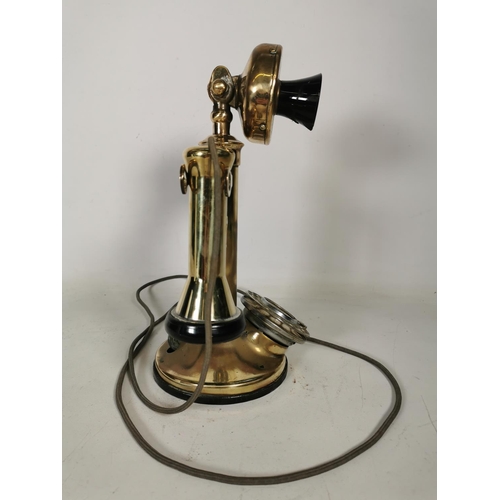 383 - An early 20th century brass candlestick telephone - approx. 31cm high