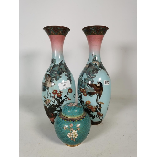 387 - Three pieces of cloisonné to include two vases with bird design - approx. 30cm high and one ginger j... 