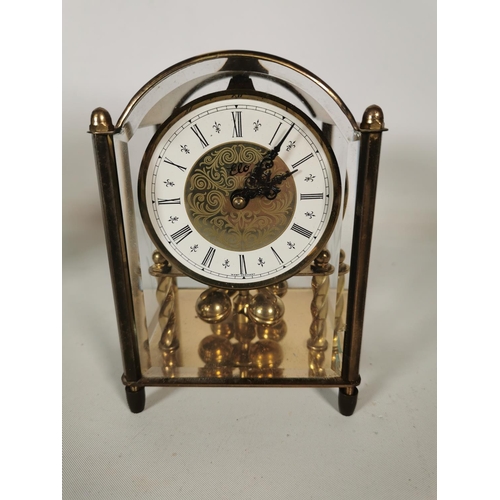 389 - Three various clocks, one French Bayard brass 8 day carriage clock, one Metamec quartz mantel clock ... 