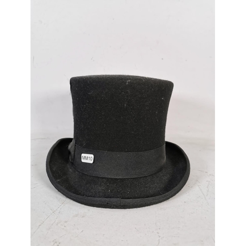 426 - A hand made 100% wool top hat