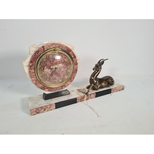 393 - An Art Deco style marble mantel clock with deer figurine and marble base - approx. 23cm high x 40cm ... 