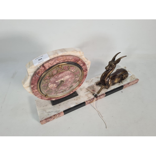 393 - An Art Deco style marble mantel clock with deer figurine and marble base - approx. 23cm high x 40cm ... 