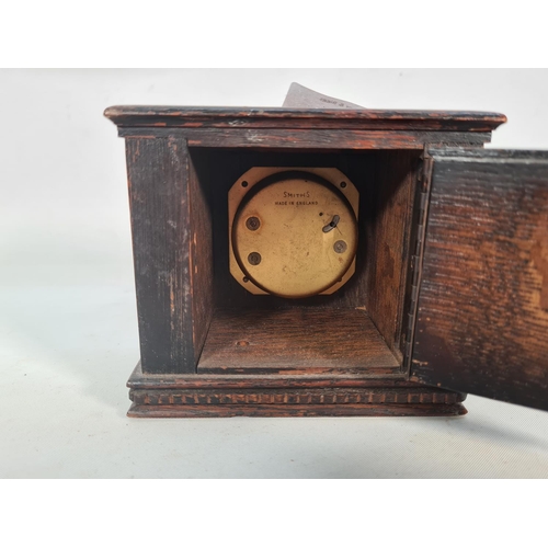 394 - A vintage Smiths oak cased 8 day miniature mantel clock - approx. 10.5cm high 11.5cm wide x 7cm deep