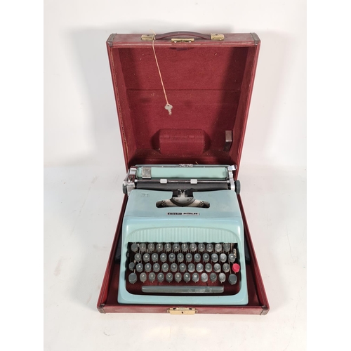 399 - A vintage cased Olivetti Studio 44 typewriter