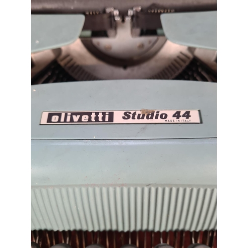 399 - A vintage cased Olivetti Studio 44 typewriter