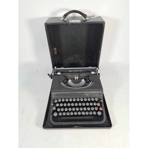 400 - A vintage cased Olivetti typewriter