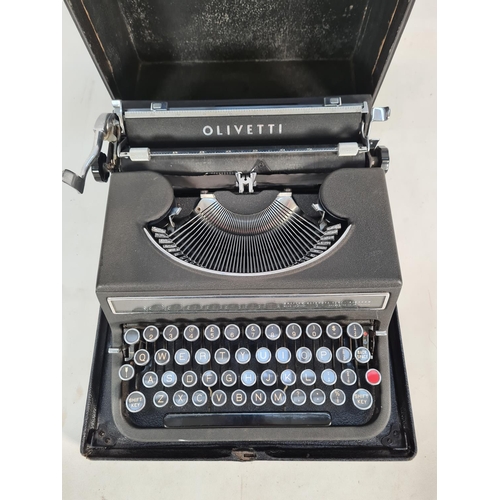 400 - A vintage cased Olivetti typewriter