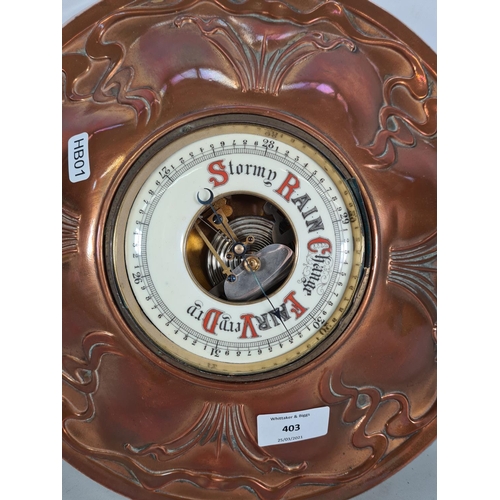 403 - An Art Nouveau copper barometer - approx. 33cm diameter