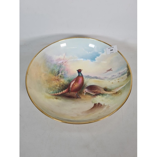 269 - A Minton bone china bowl with pheasant design, signed L. Woodhouse - approx. 29cm diameter x 7.5cm h... 