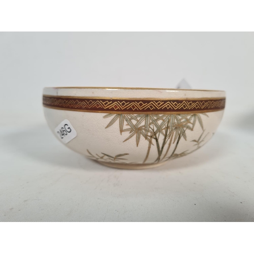 271 - An oriental porcelain bowl with bamboo tree design - approx. 15cm diameter x 6.5 cm high