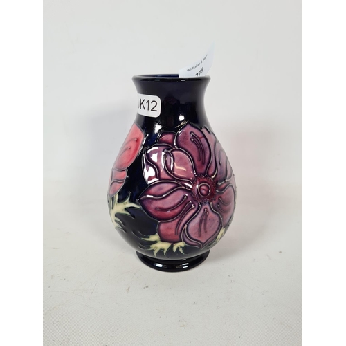 275 - A Moorcroft pottery baluster vase - approx. 14cm high