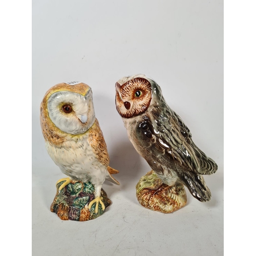 282 - Two ceramic owl figurines, one Beswick model no. 1048