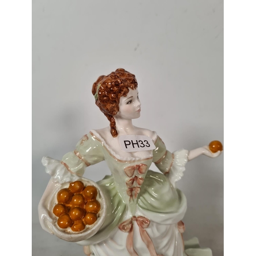 296 - A Coalport limited edition no. 5559 of 12,500 Femmes Fatales Nell Gwynn figurine with certificate