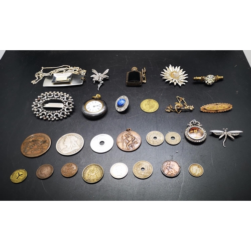 115 - A collection of various items to include brass heraldic match striker, yellow metal and seed pearl h... 