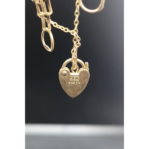 117 - A hallmarked 9ct gold four gate bracelet with heart shaped clasp - approx. gross weight 6.55 grams