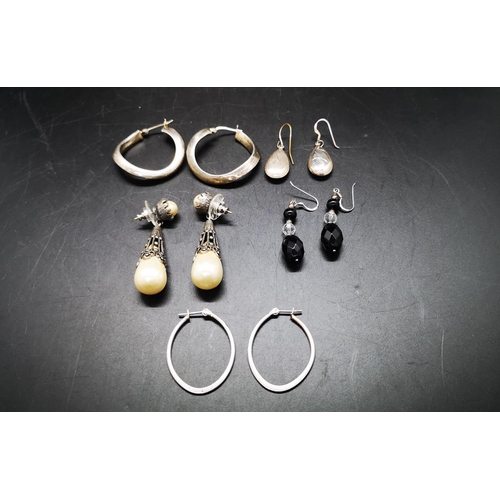 129 - Five various pairs of earrings, three pairs of 925 silver earrings, one pair of white metal and simu... 