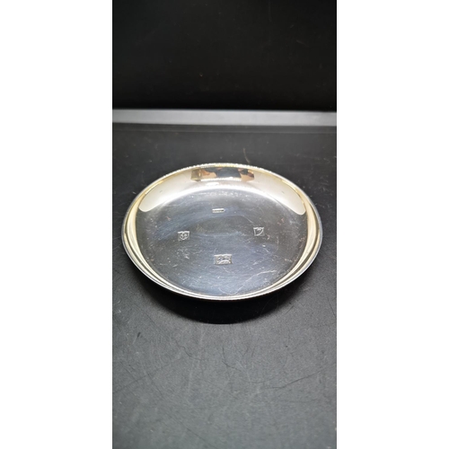13 - A hallmarked Birmingham silver circular dish, dated 1958 - approx. gross weight 62 grams and 8cm dia... 