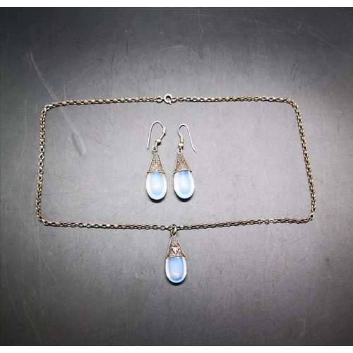 134 - A 925 silver and opalescent necklace and earrings set - approx. combined gross weight 15.4 grams