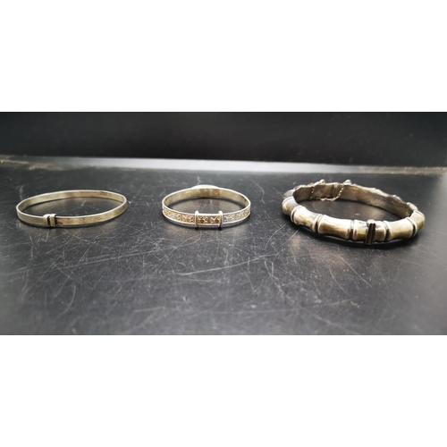 135 - Three various silver bangles, one 925 silver 