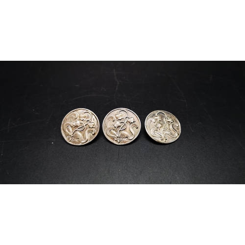 136 - Three items, two matching hallmarked London silver buttons with floral design and one 800 grade silv... 