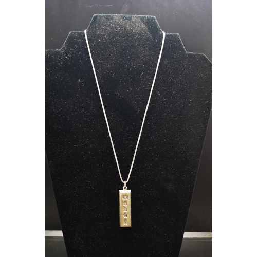 145 - A hallmarked Sheffield silver ingot pendant dated 1977, on 925 silver necklace - approx. gross weigh... 