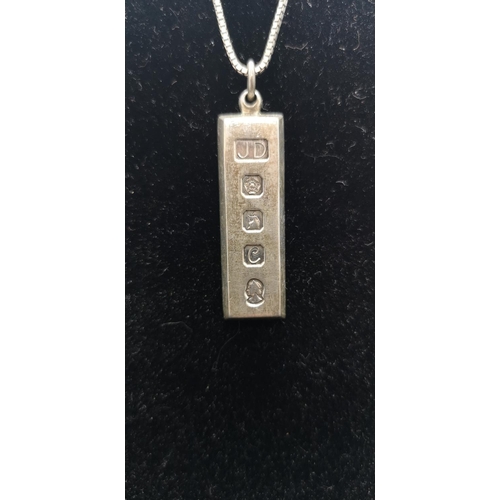 145 - A hallmarked Sheffield silver ingot pendant dated 1977, on 925 silver necklace - approx. gross weigh... 
