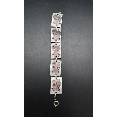 148 - Two vintage enamel belt buckles and one Wiener Handwerk enamel bracelet