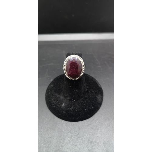 153 - A 925 silver ruby ring - approx. size K
