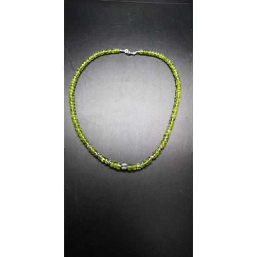 156 - A peridot gemstone bead necklace with 925 silver clasp
