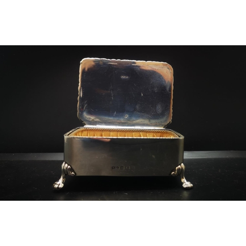 17 - A hallmarked Birmingham silver miniature jewellery box on footed base with silk lined interior by Wi... 