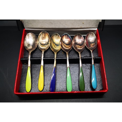 26 - A cased set of six vintage silver plate and enamel tea spoons