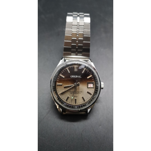 56 - An Original water protected antimagnetic stainless steel Swiss made wristwatch