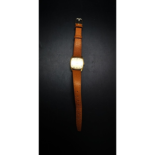 72 - A vintage Bulova Longchamp Swiss made wristwatch