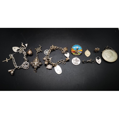 77 - A collection of hallmarked silver and white metal items to include hallmarked silver charm bracelet ... 